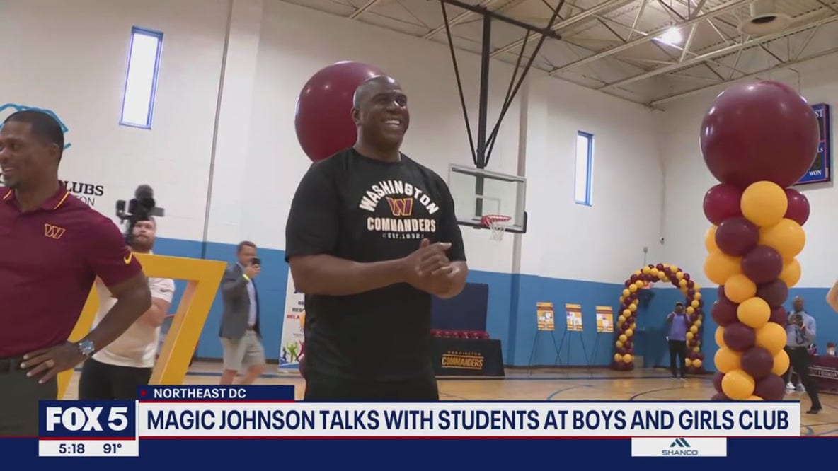 Magic Johnson talks with students at DC Boys and Girls Club